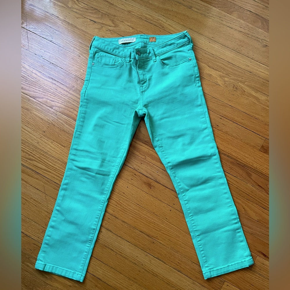 Cropped mint-colored jeans